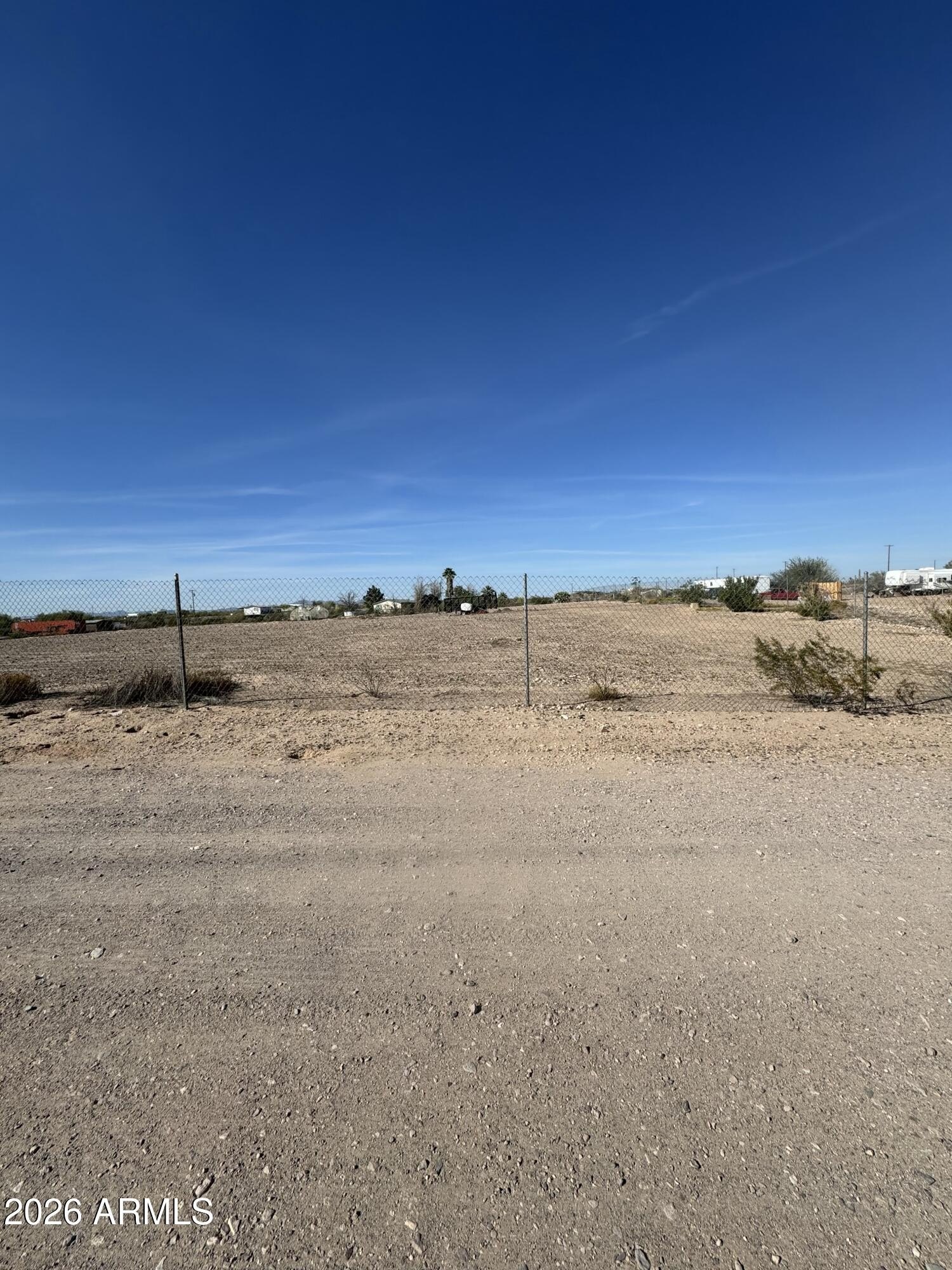 Fenced Lot Near Freeway