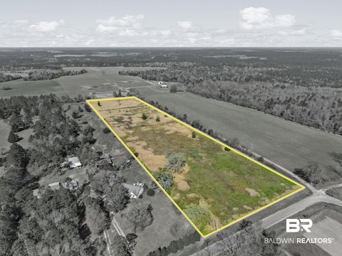 Unzoned Cleared Land with Road Utilities