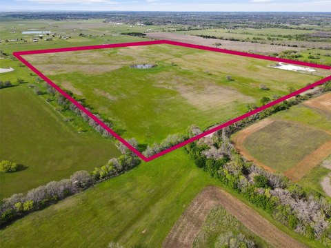 Rolling Pasture Land with Stock Pond