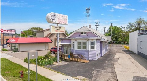 Retail Storefront with Pole Sign