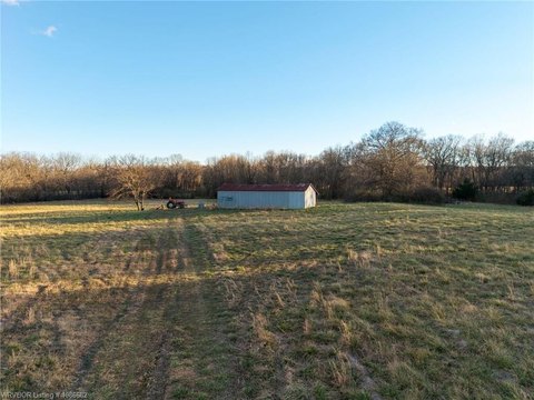 Greenwood Land with Creek and Barn