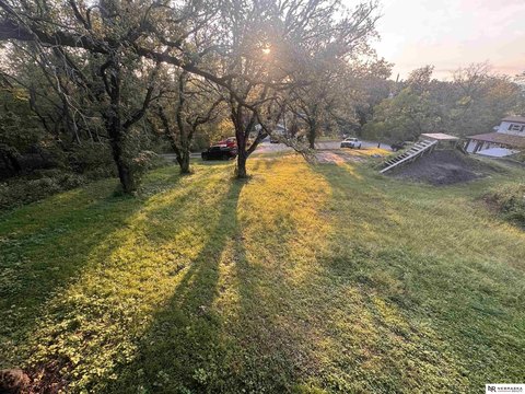 LAND, Louisville, NE