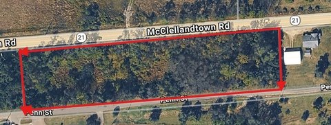 Wooded Commercial Land Parcel