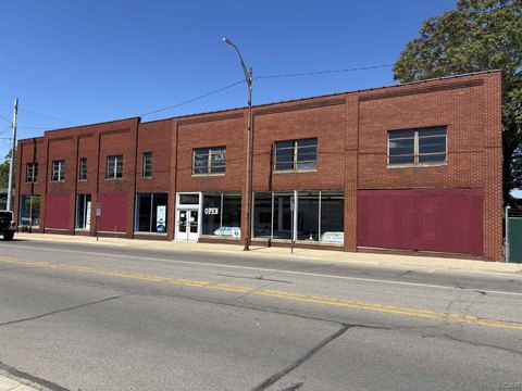 Downtown Corner Building with Parking