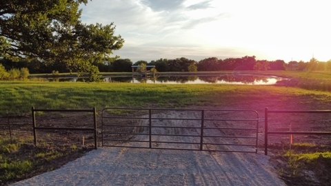 Gated Ranch Acreage with Pond