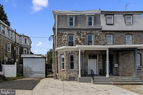 Renovated Triplex with Detached Garages