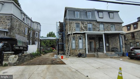 Renovated Triplex with Garage Storage