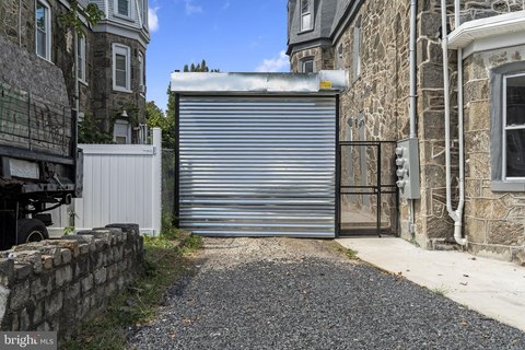 Renovated Triplex with Detached Garages