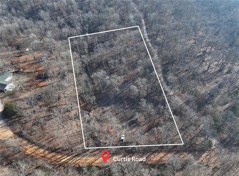 Gravette Buildable Lot with Wooded Serenity