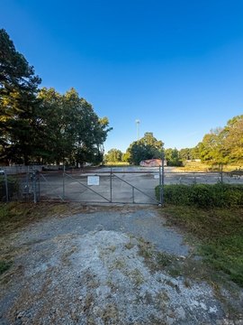Fenced Industrial Land with Concrete Slab