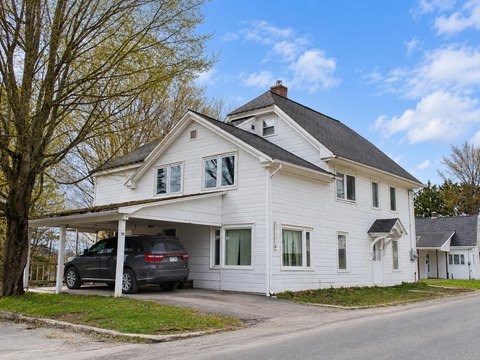 Duplex with Garage and Carport