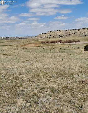 Pueblo Acreage with Mountain Views