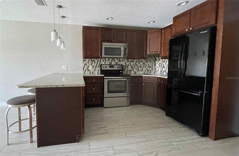 Renovated Condo in Multifamily Community