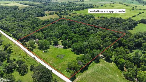 Updated Farmhouse on Fenced Acreage