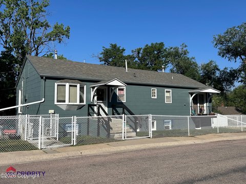 Triplex with Carport and Fenced Yard