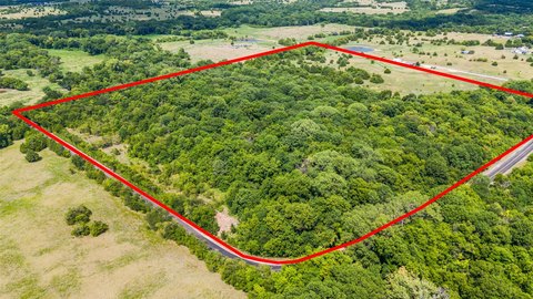 19.7-Acre Ag Land with Pond Views