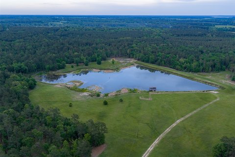 Ranch with Stocked Lake & Timber