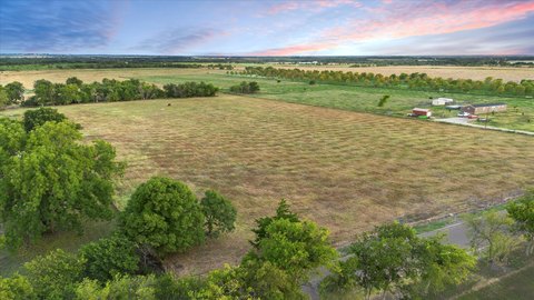 Fenced Ranch Land with Stock Tank