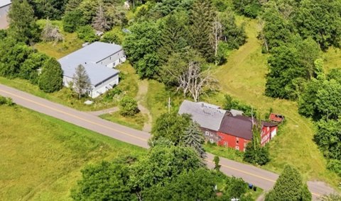 Wooded Acreage with Warehouse Quarters