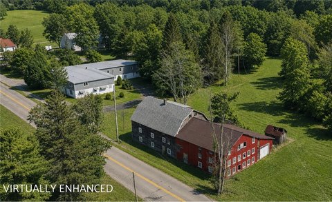 Wooded Acreage with Warehouse Quarters