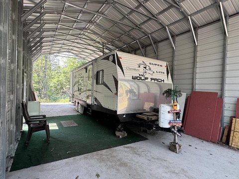Wooded Hunting Land with Storage Building