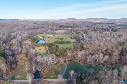 Developable Farm Tract with Four Homes