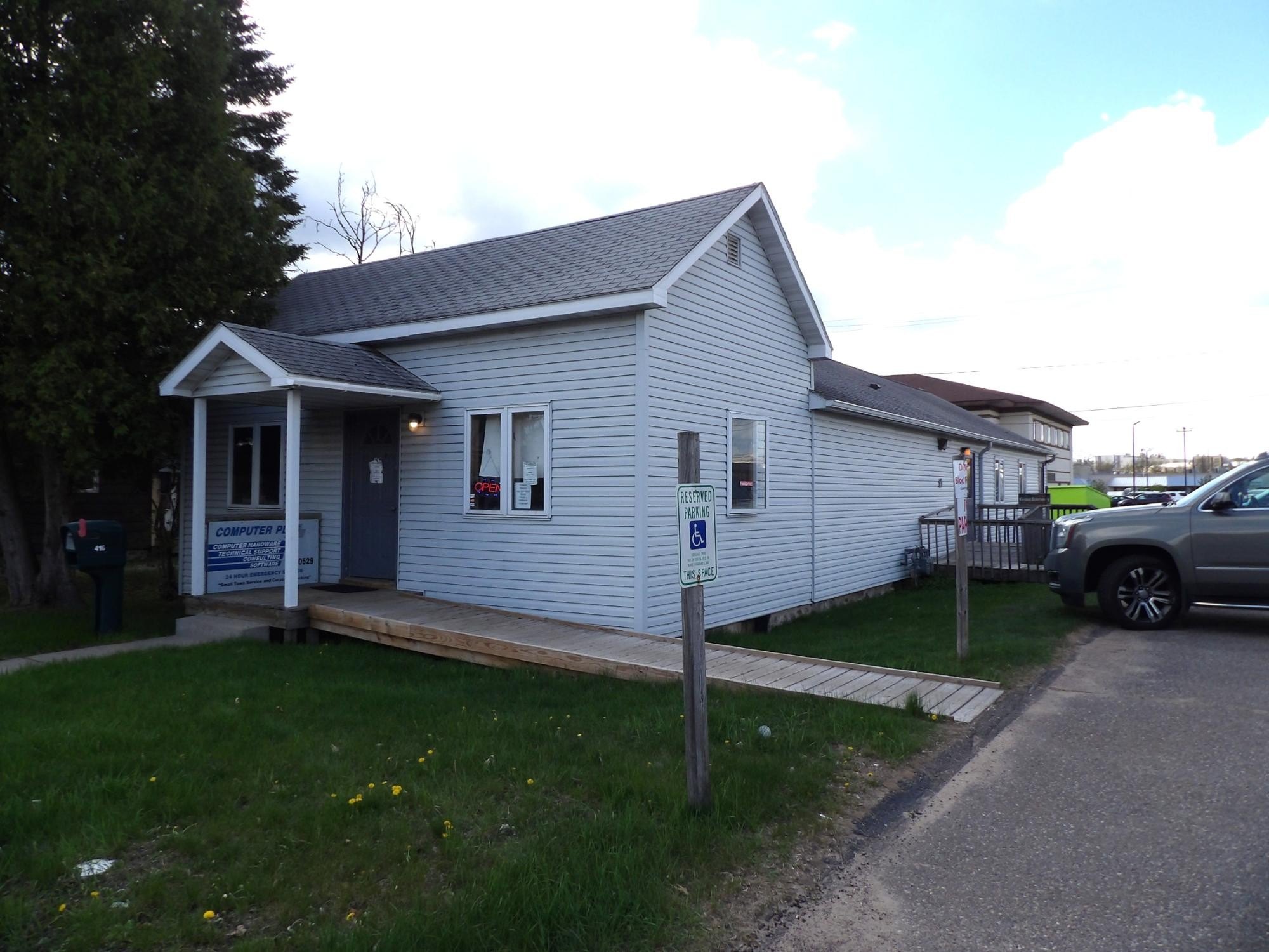 Rhinelander Three-Unit Office Building