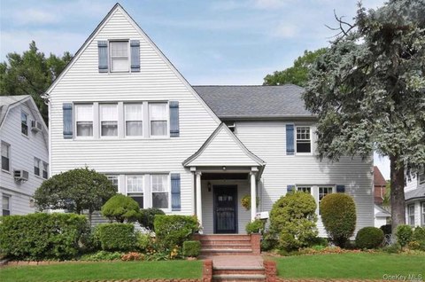 Detached Two-Family Home with Private Garage