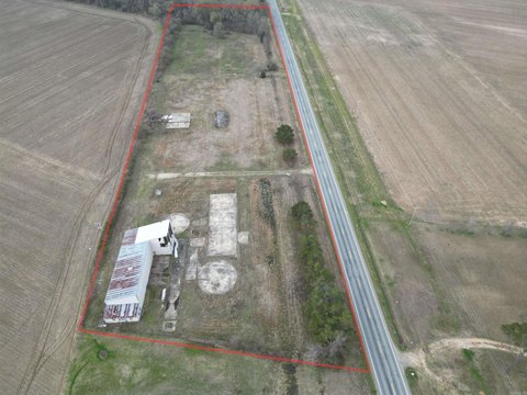 Highway Frontage Acreage with Building