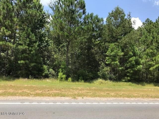 Land on Heavily Traveled Highway