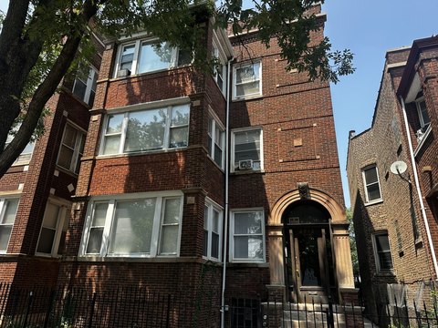 Brick Apartment Building with Garage