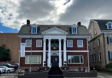 All-Brick Commercial Building with Apartments