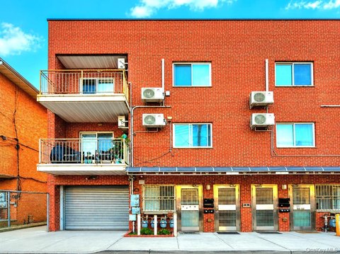Three-Unit Brick Triplex with Garage