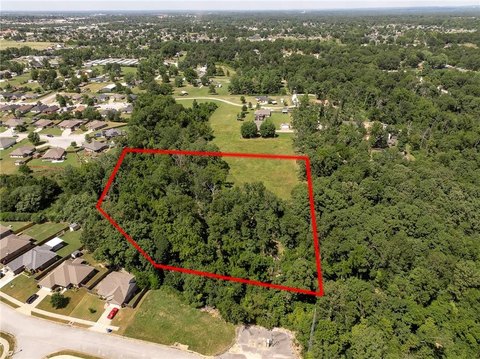 Rogers Acreage with Development Potential