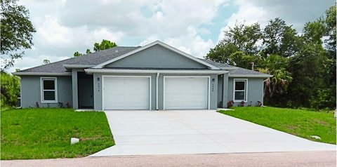 Upgraded Duplex with Two Garages