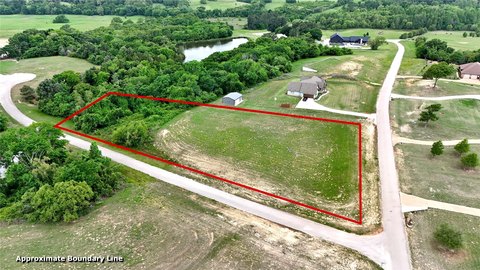 Lakefront Corner Lot in Gated Community
