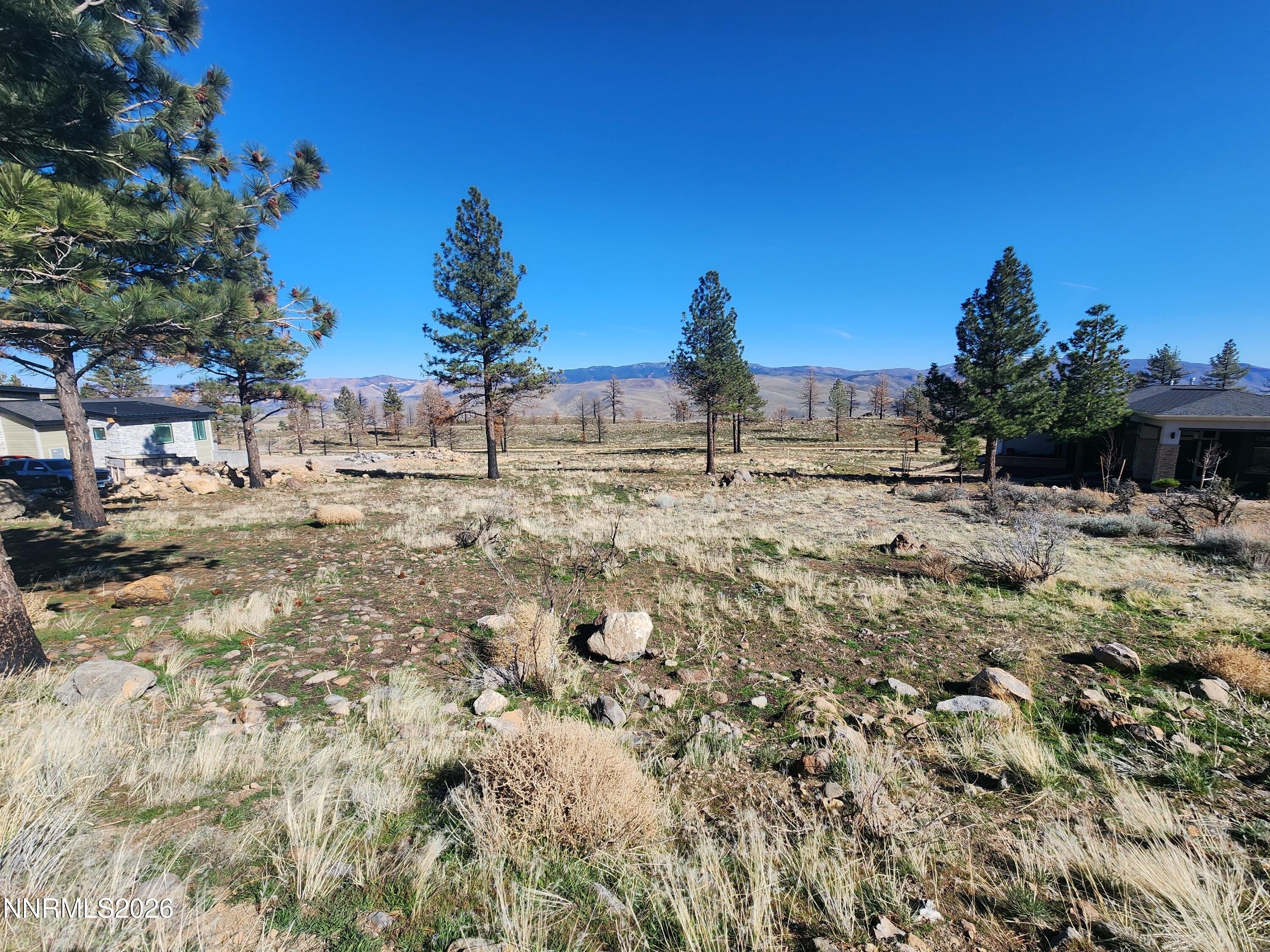 Land with Mountain and Lake Views