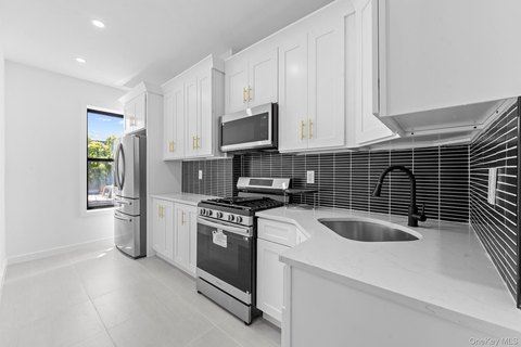 Renovated Two-Family Brick Residence