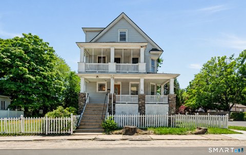 Triplex With Detached Three-Bay Garage