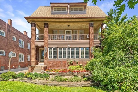 Brick Triplex with Four-Car Garage