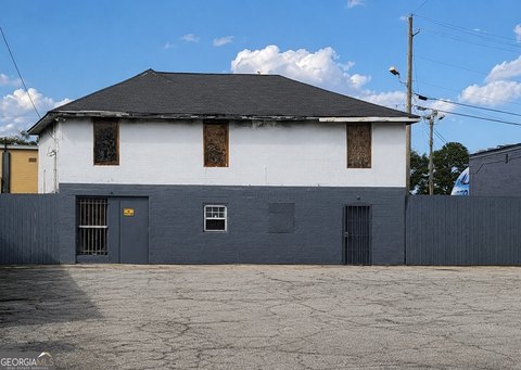 Concrete Retail Building with Parking Lot