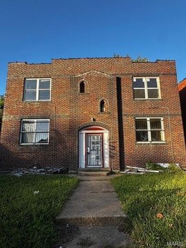 Semi-Renovated Triplex