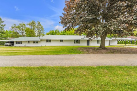 Whitmore Lake Triplex For Sale