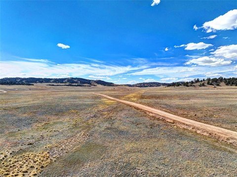 Land with Panoramic Mountain Views