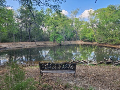 Acreage with Pond and Metal Shop