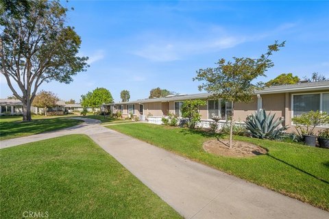 Two-Bedroom Specialty Property with Greenbelt View