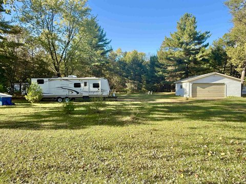 Wooded Getaway Property with Camper