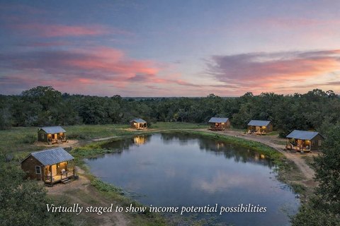 Unrestricted Waterfront Land with Pond