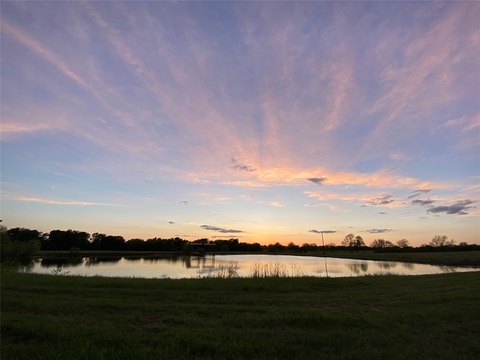 7.5 Acres with Stocked Pond