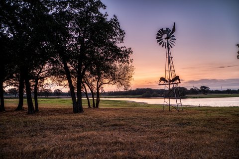Highly Improved Ranch with Private Lake